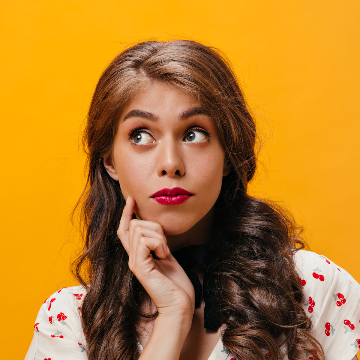 lady-thoughtfully-poses-on-orange-background-pens-2022-02-06-21-55-33-utc.jpg